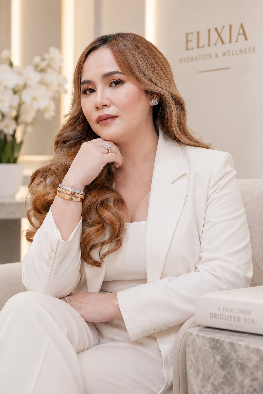 Portrait representing Hazel Bao-as, RN, MSN, Founder and CEO of ELIXIA Hydration and Wellness
